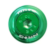 Green metal bicycle headset cap from NRG Fender Washer Kit with fender washer for bikes