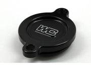 Black circular oil filter cover with mounting holes for Kaw engines