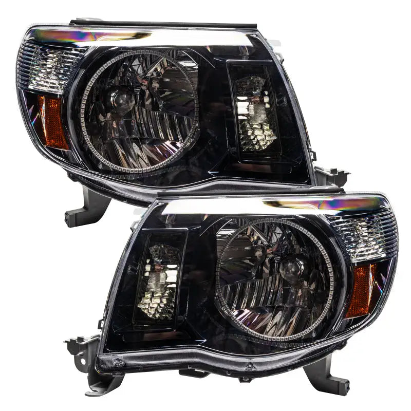 Black projector headlights for Toyota Tacoma with SMD LEDs from Oracle Tacoma SMD Series