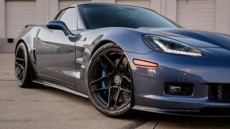 Sleek gray Chevrolet Corvette with custom wheels showcasing the Oracle 05-13 Concept Sidemarker Set