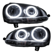 Black aftermarket headlights with white LED halo rings for Volkswagen Jetta SMD models