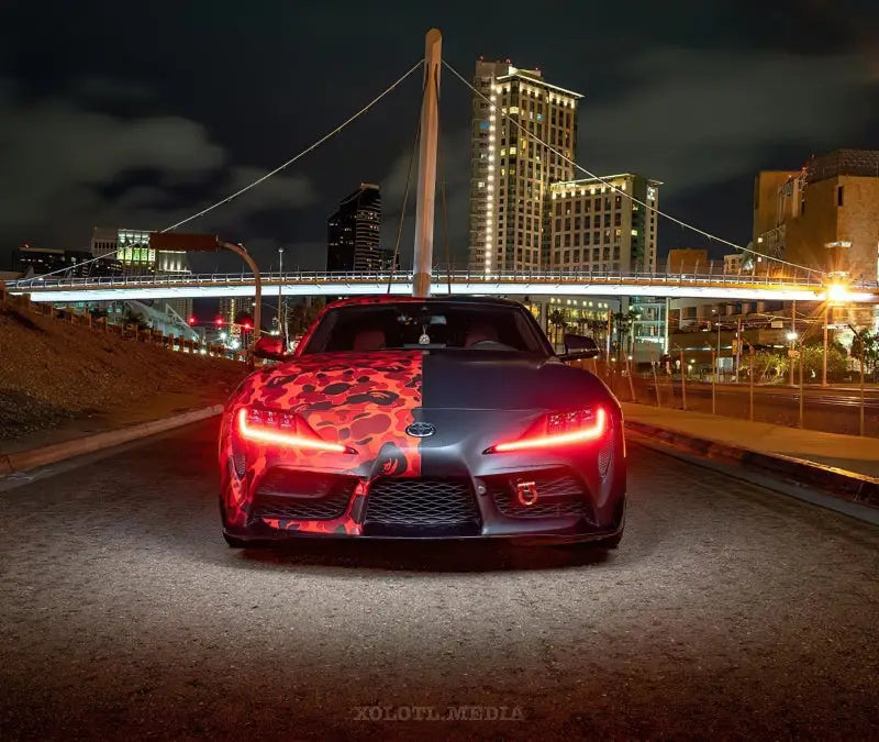 Two-toned Toyota Supra with Oracle RGB+A DRL upgrade kit and sleek headlight design