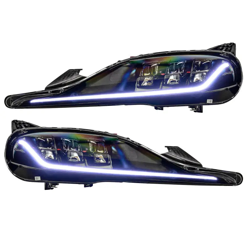 Blue car headlights from the Oracle RGB+A DRL upgrade kit for Toyota Supra