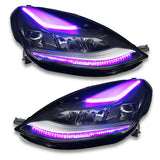 Pair of aftermarket Tesla Model 3 headlights with purple LED accents and dynamic colorshift tech