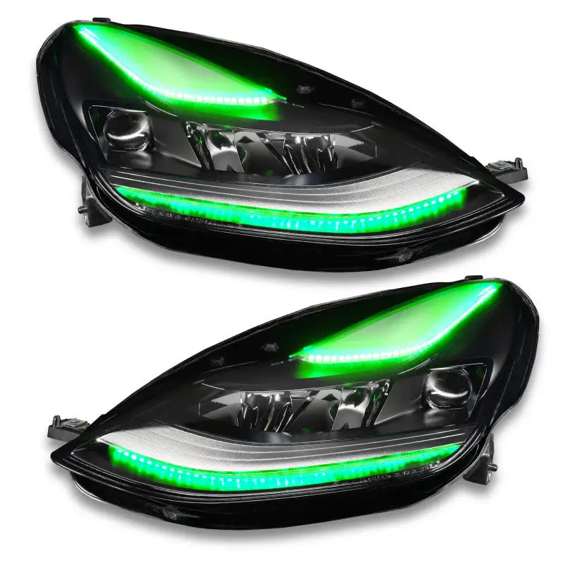 Pair of black car headlights with green LED accents for Oracle Tesla Model 3 colorshift headlight DRL