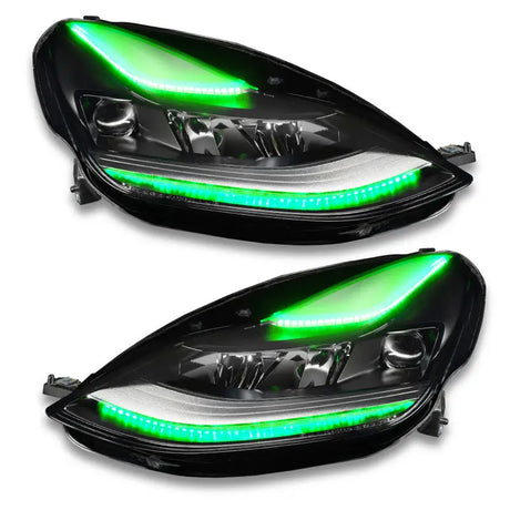 Pair of black car headlights with green LED accents for Oracle Tesla Model 3 colorshift headlight DRL