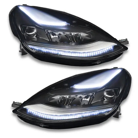Pair of black car headlights with LED strips for the Oracle 2021+ Tesla Model 3 Colorshift Headlight DRL with dynamic colorshift effect
