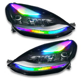 Pair of aftermarket Tesla Model 3 headlights with rainbow LED accents and colorshift DRL