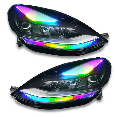 Pair of aftermarket Tesla Model 3 headlights with rainbow LED accents and colorshift DRL