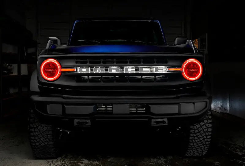 Blue Ford Bronco with illuminated colorshift headlight halo kit and DRL bar
