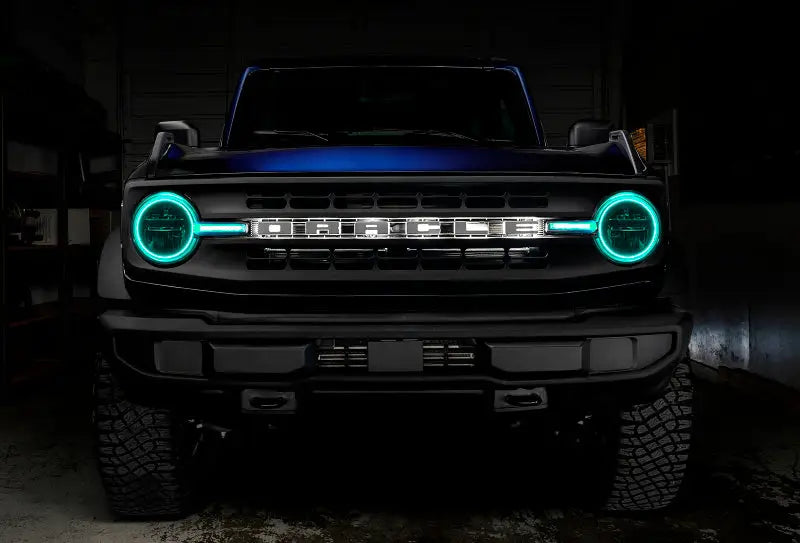 Blue Ford Bronco with illuminated colorshift headlight halo and headlight halo kit