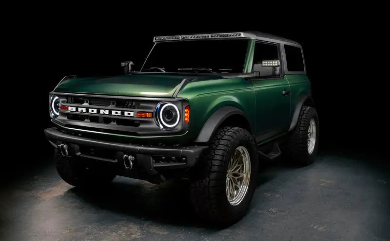 Green Ford Bronco with custom wheels showcasing Oracle Bi-LED Projector Headlights