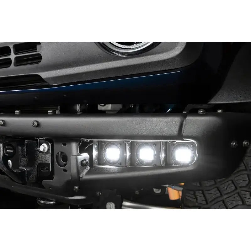 Black truck bumper with integrated fog light kit for Ford Bronco in white