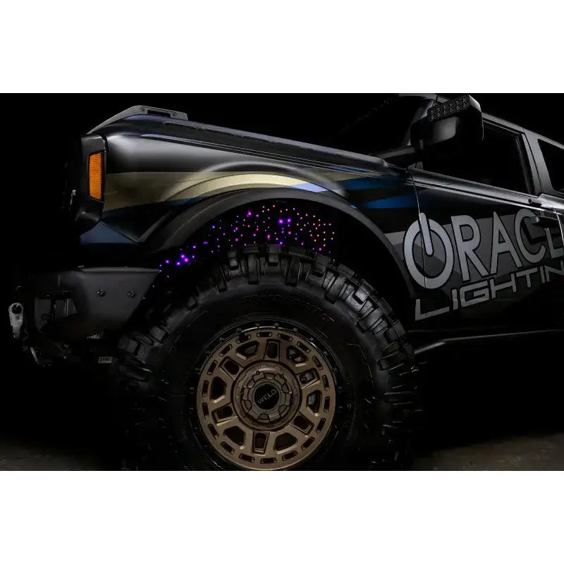 Black Ford Bronco with purple lighting fiber optic wheel liner from Oracle Lighting Fiber Kit