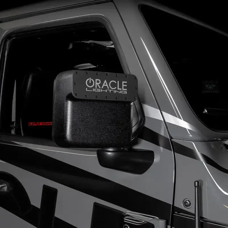 Black Oracle Lighting side mirror with Oracle Magnetic Light bar cover for LED side mirrors