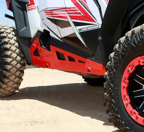 Red and white off-road vehicle with P141221PR Pro Armor Rock Sliders for P141221PR Pro
