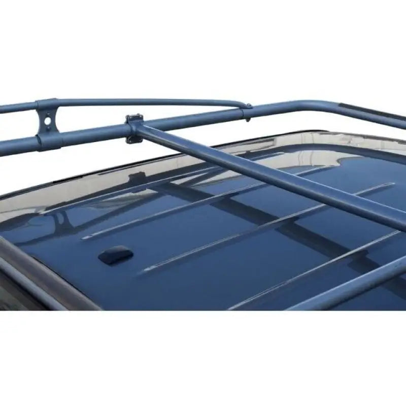 Blue metal roof rack on Dge Ram for easier hauling P31740 Holman ladder mount