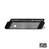 Black engine cover with silver stripes from Performance Machine Contrast Cut latch plate set
