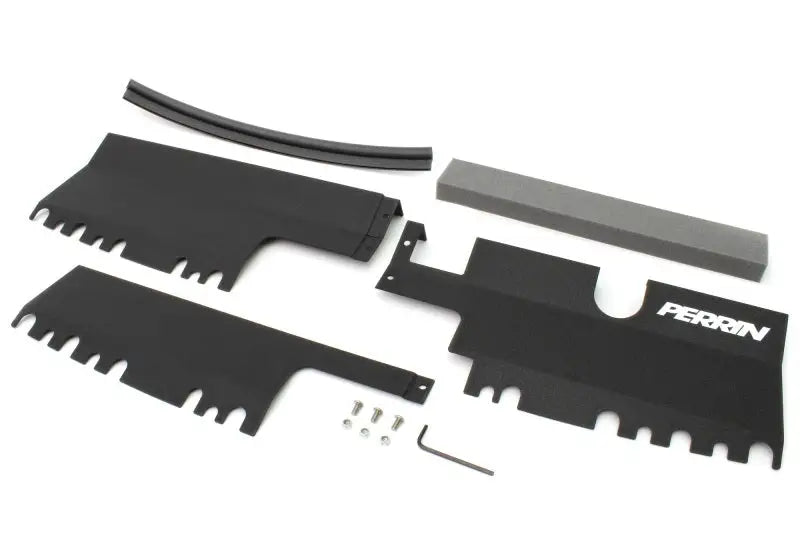 Perrin 2015 WRX/STi Black Radiator Shroud with mounting hardware and foam padding.
