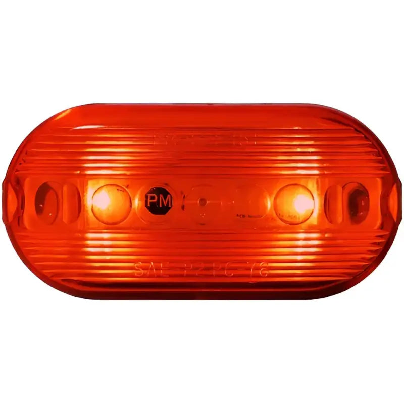 Illuminated orange oval marker light on Peterson MFG M35R-MV-BT2 truck part