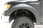 Black Ford F-150 truck.