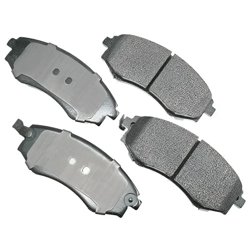 Four car brake pads from PGD700C R/M Brake Pad Set, perfect brake pad set for your vehicle