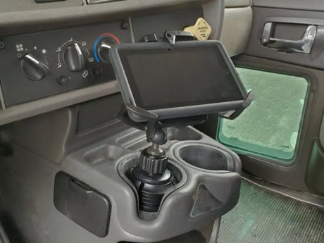 Tablet mounted in a vehicle’s cup holder using Havis Cup Holder for 7-9 inch devices