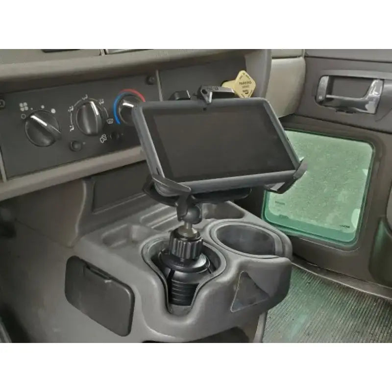 Tablet mounted in a vehicle’s cup holder using Havis Cup Holder for 7-9 inch devices