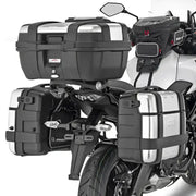 Motorcycle with matte black hard luggage mounting hardware and silver tank bag