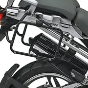 Rear view of motorcycle with matte black luggage mounting hardware and exhaust pipe
