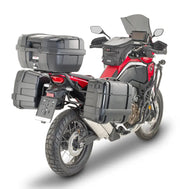 Red and black adventure motorcycle with PLO1179MK hard luggage mounting hardware