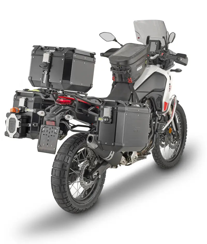 Adventure motorcycle with PLO2145CAM hard luggage mounting hardware and storage cases