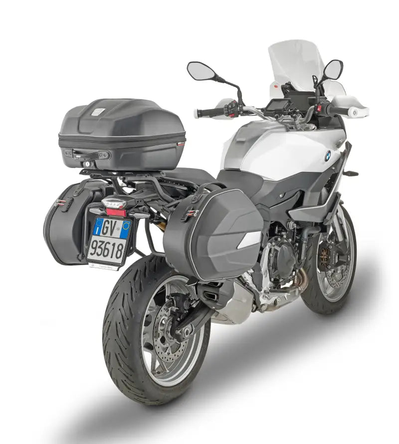 White and grey touring motorcycle with saddlebags and top case showing PLO5137MK luggage mounting hardware
