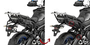 Motorcycle with matte black luggage mounting hardware and detachable hard luggage racks