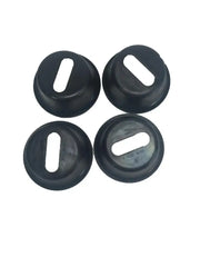 Four black rubber grommets with rectangular holes for cleat hole boot pockets