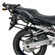 Rear view of black motorcycle with top case and pannier rack using PLX351 Side Case Hardware for hard luggage mounting