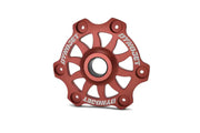 Red metal hub with six mounting points for Primary Pressure Plate Kit use