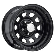 Black steel Pro Comp 51 Series 17x9 wheel with circular cutouts for off-road style