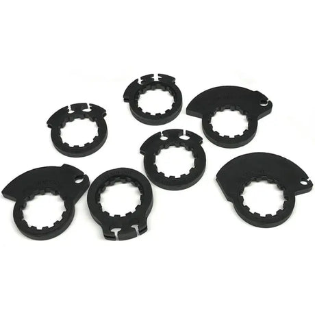Seven black toothed-ring components with partial covers for ProTaper Clamp-On Pillow Top Grips Neon Yellow Gray