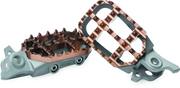 Motorcycle footpegs with copper grid pattern from ProTaper KTM Husqvarna footpeg kit