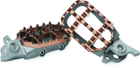 Motorcycle footpegs with copper grid pattern from ProTaper KTM Husqvarna footpeg kit