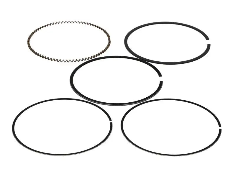 ProX ring set with five black piston rings, one serrated edge