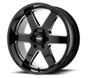 Black six-spoke PTRL 18x9 gloss black molded off-road wheel for tough looks