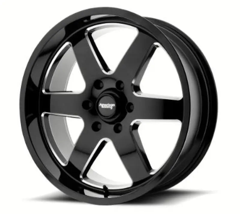 Black six-spoke PTRL 18x9 gloss black molded off-road wheel for tough looks