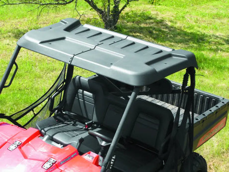 Gray utility vehicle roof for Polaris Ranger folding windshield in tough weather conditions