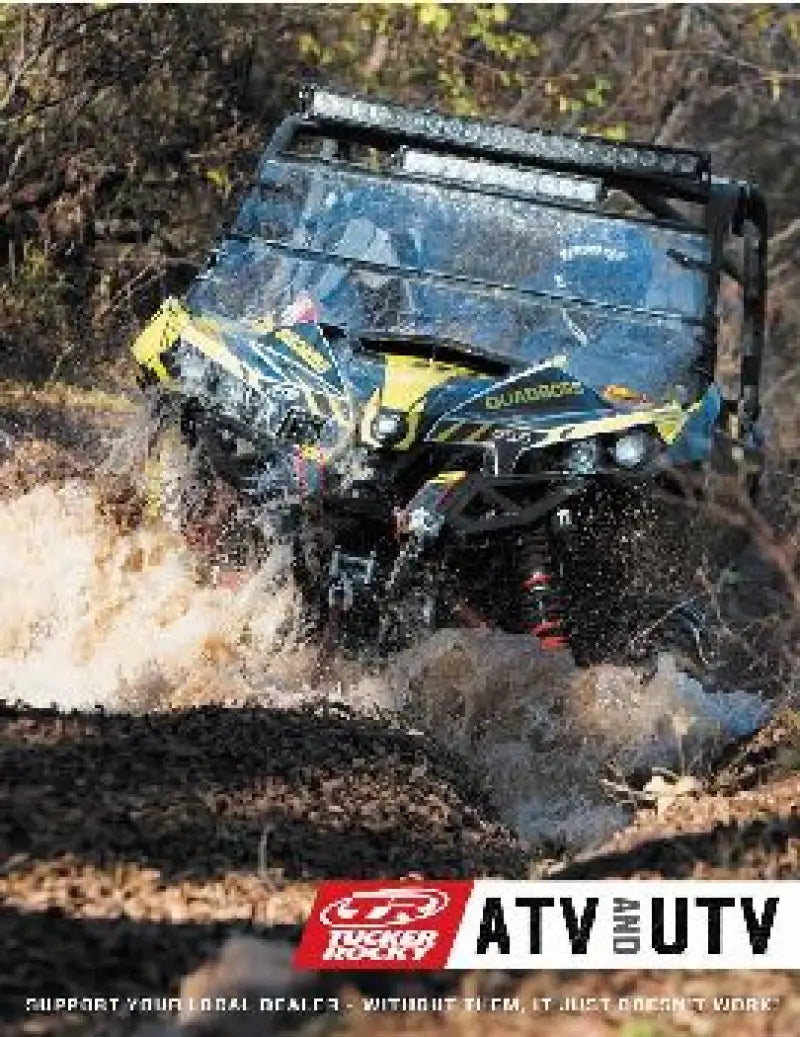 Arctic Cat 4x4 FIS ATV splashing water with Carburetor Kit installed for off-road fun