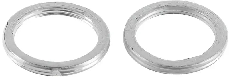 Two metallic exhaust gaskets from QuadBoss Exhaust Gasket Kit for durable performance