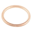 Copper-colored metal ring from QuadBoss Exhaust Gasket Kit for quadboss exhaust systems