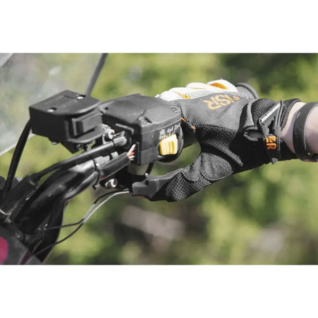 Motorcycle handlebar with gloved hand using QuadBoss Heated Grips with thumb warmer