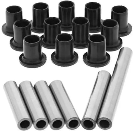Black flanged bushings and metal sleeves from the QuadBoss Qboss A-Arm Bushing Kit